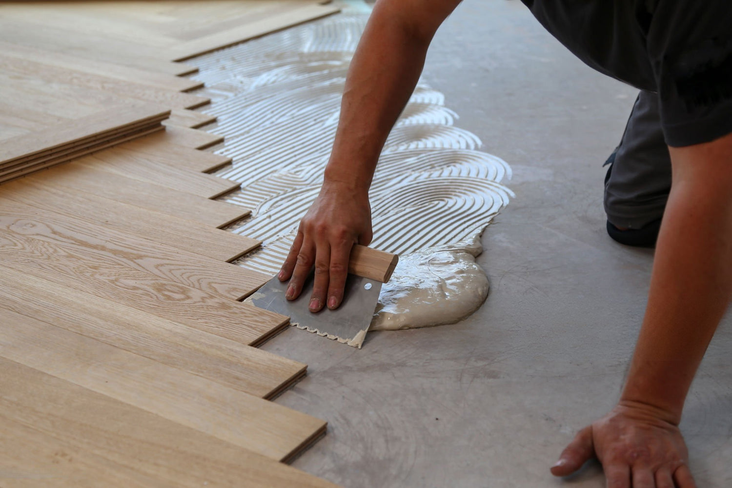 Herringbone floor glue-down installation by florida hardwood floors