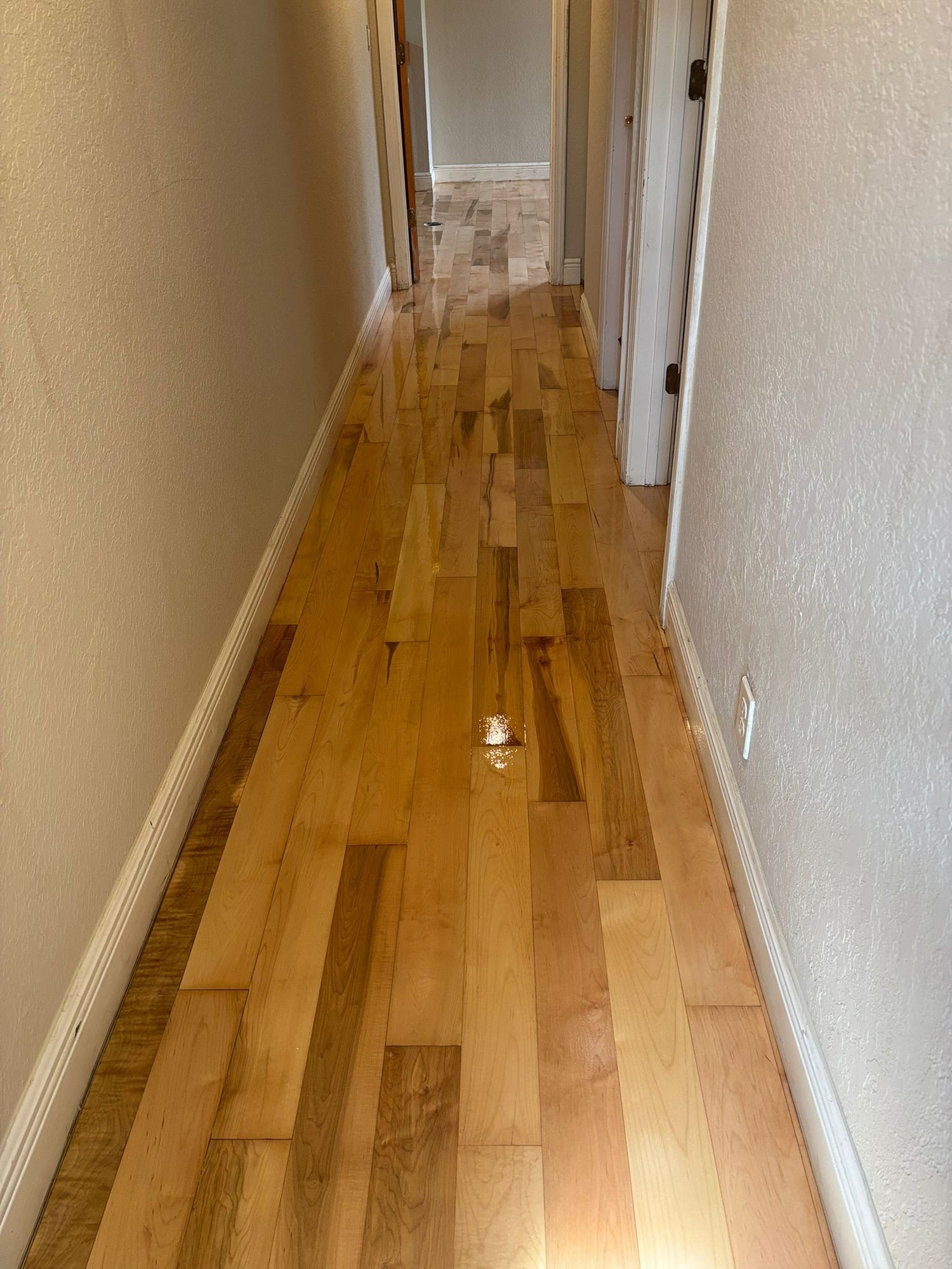 Refinished white oak floors in coconut creek residency
